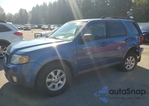 2009 Mazda Tribute I from USA, damaged, VIN 4F2CZ02789KM03061